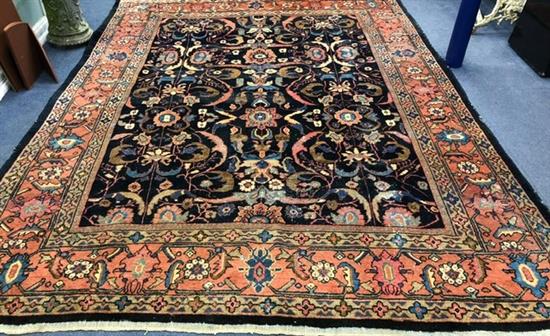 A Persian blue ground carpet 350 x 270cm